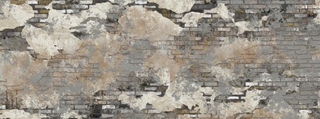 Eine Wand aus Ziegelsteinen mit abbröckelndem Putz
